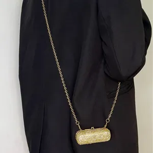 Mini rhinestone crossbody bag for women, sparkling crystal pill box clutch with gold chain.