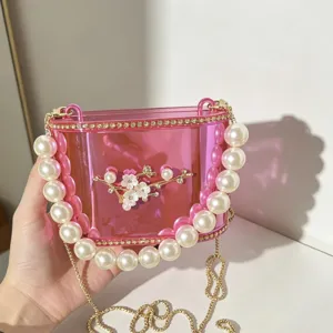 Borsa a mano scatola in acrilico rosa con perle e decoro floreale. Elegante borsa a tracolla.
