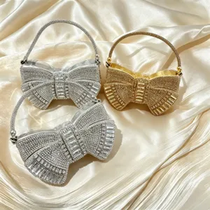 Stunning rhinestone bow evening bag, sparkling crystal clutch for elegant party wear.