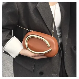 Stylish retro brown hard shell crossbody bag with unique metal handle and chain strap.