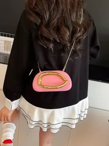 Stylish pink shoulder bag with unique gold metal handle, elegant design for women and evening events.
