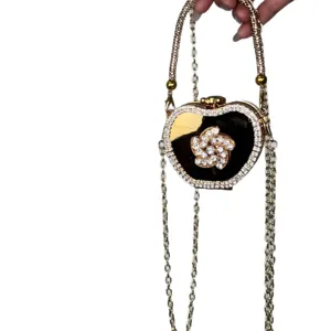 Borsa a tracolla con catena in strass a forma di mela dorata pochette da sera lusso.