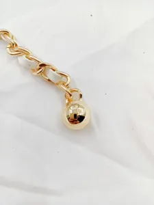 Gold metal chain waist belt with woven white leather and ball pendant for women fashion accessory