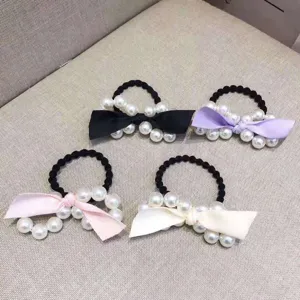 Elegant pearl hair ties with cute satin bow knots, black elastic scrunchies for daily hairstyles.