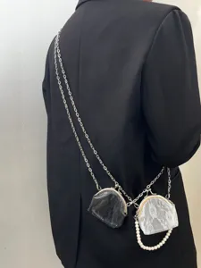Retro Chinese style kiss-lock coin purse, stylish mini crossbody bag for daily women.