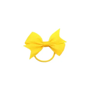 Élastique à cheveux nœud papillon en ruban gros-grain jaune 6cm pour jolies filles.