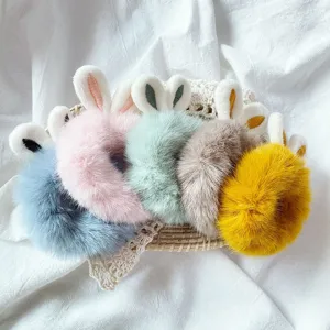 Fluffy plush bunny ear hair scrunchies set, soft fuzzy hair ties for cute daily styling.