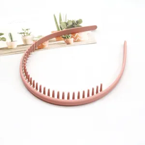 Korean style pink frosted anti-slip hair hoop with teeth for face washing and daily wear.