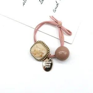 Chouchou style ins coréen avec pendentif en résine et perle marron, élastique haute élasticité.