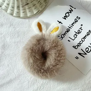 Fluffy brown plush hair scrunchie with cute bunny ears, soft faux fur detail show view