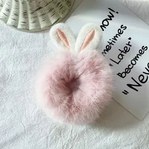 Pink plush rabbit ear hair scrunchie cute fuzzy hair band for women and girls daily wear detail shot
