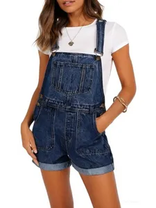 Women blue washed denim overall shorts detail view, featuring classic bib pockets and buttons.