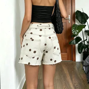 Womens polka dot denim shorts with braided drawstring detail, casual summer high waist jean shorts.