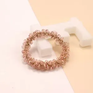 Sparkling pink crystal beaded hair tie, versatile hair rope and bracelet for women, chic pony tail.