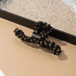 Pinza de pelo de tweed negro y dorado, elegante garfio grande para peinado detalle.