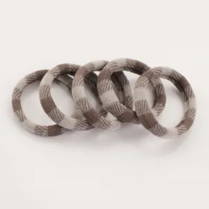 Detail shot of brown plaid hair ties, super elastic seamless rubber bands for women daily wear.