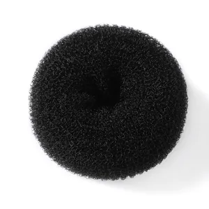 Closeup view of black hair donut bun maker detail, ideal for easy daily hairstyling loops.