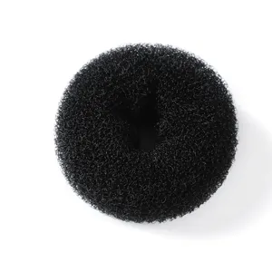 Close-up detail shot of the black mesh hair donut bun maker, showing the fine texture.