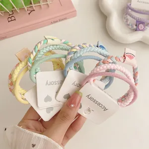 Close-up detail of multi-colored braided hair tie sets, high elasticity, cute accessory cards.