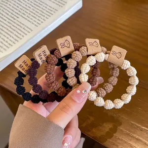 Cute rabbit hair ties with handmade balls, elastic rubber hair bands for women daily use.
