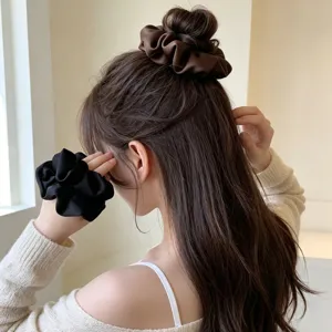 Satin hair scrunchie for women, elegant minimalist ponytail holder, soft glossy hair accessories.