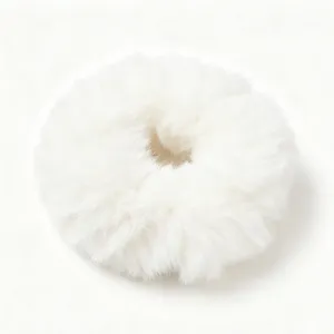 White plush hair scrunchie detail view, soft faux mink fur texture, comfortable hair accessory.