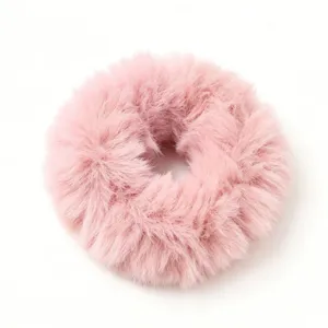 Close-up detail of the pink fluffy hair scrunchie, soft faux mink fur texture for sweet styling.