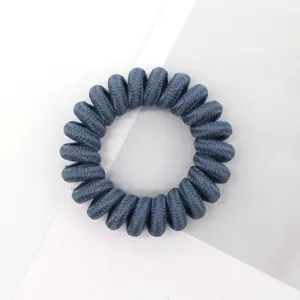 Dark blue braided phone cord hair tie detail, elastic spiral hair band accessory for daily wear.
