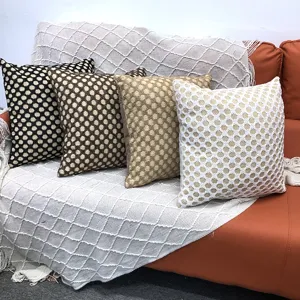 Detailed view of the knitted textured throw pillow set showcasing intricate grid patterns.