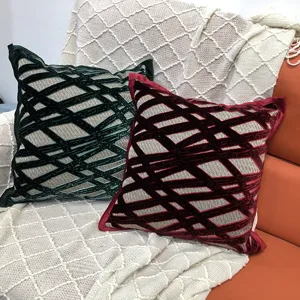 Modern geometric cut velvet throw pillow cover with elegant piped edges for sofa decor.