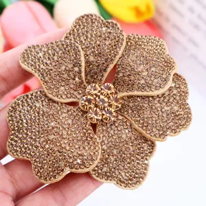 Brown rhinestone flower patch, sparkling crystal shoe clip and apparel DIY accessory.