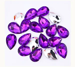 Colorful acrylic teardrop rhinestones for DIY clothing crafts and sparkling decorations.