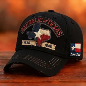 Primo piano di un berretto da baseball nero in cotone con ricamo del Texas e logo.