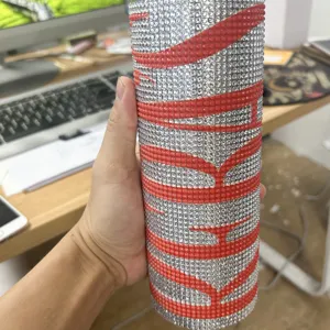 20oz rhinestone insulated tumbler with sparkling crystals and portable design for daily use.