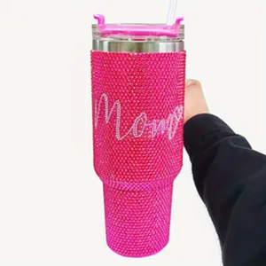 Detailed view of the pink rhinestone 40oz tumbler featuring sparkling crystals and mom text.
