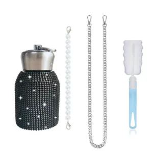 Rhinestone insulated water bottle set with pearl strap, metal chain, and cleaning brush.