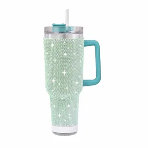 40oz rhinestone stainless steel insulated tumbler with handle straw and bluetooth speaker base.