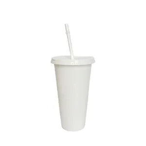 Close-up detail of 24oz white plastic tumbler cup with lid and straw for outdoor drinks.
