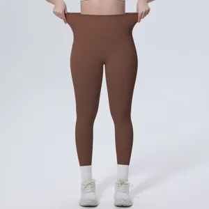 High-waisted brown yoga pants for women, stretchy athletic leggings for gym fitness running.