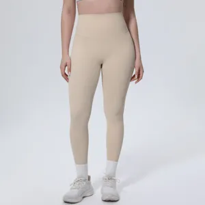 High waist nude yoga pants detail view showing soft fabric and comfortable fit for workout.