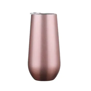 Detailed close-up of a 6oz rose gold stainless steel champagne tumbler with clear lid.