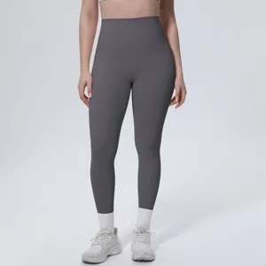 High-waisted dark gray yoga leggings detail view, tight fit activewear pants for gym fitness.