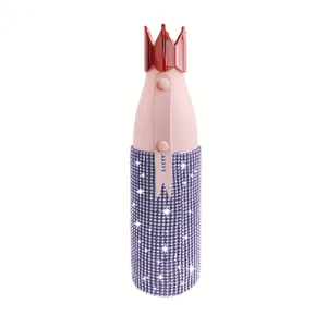 Rhinestone insulated water bottle detail showing purple crystal texture and crown cap design.