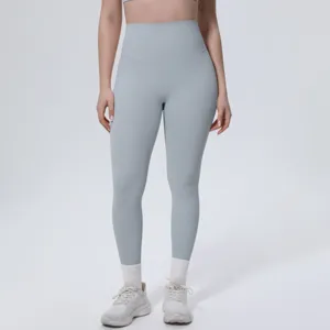 Close-up of high-waist solid color yoga leggings showing soft fabric and comfortable fit.