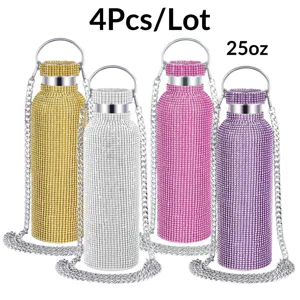 Detailed close up of rhinestone insulated water bottle with chain and crystal texture.