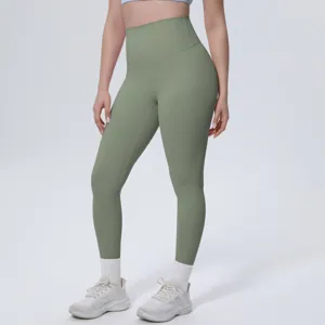 Close-up view of solid color high-waist yoga pants detail, breathable fitness leggings.