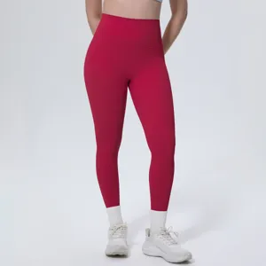 High waist red yoga pants detail view, skin-friendly breathable fabric for fitness sports workout.