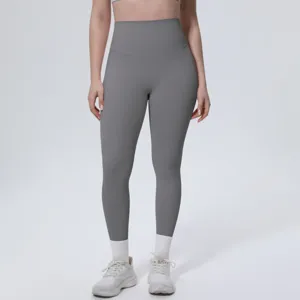 High waist solid color yoga pants, detailed view showing fabric stretch and fit for workouts.