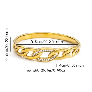 Gold-colored titanium steel hinged bangle bracelet featuring a crystal-paved interlocking link design.