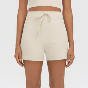 High-waisted athletic shorts with drawstring and side pockets, perfect for yoga, gym and daily wear.